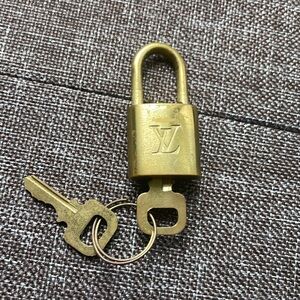 Louis. Vuitton lock and key